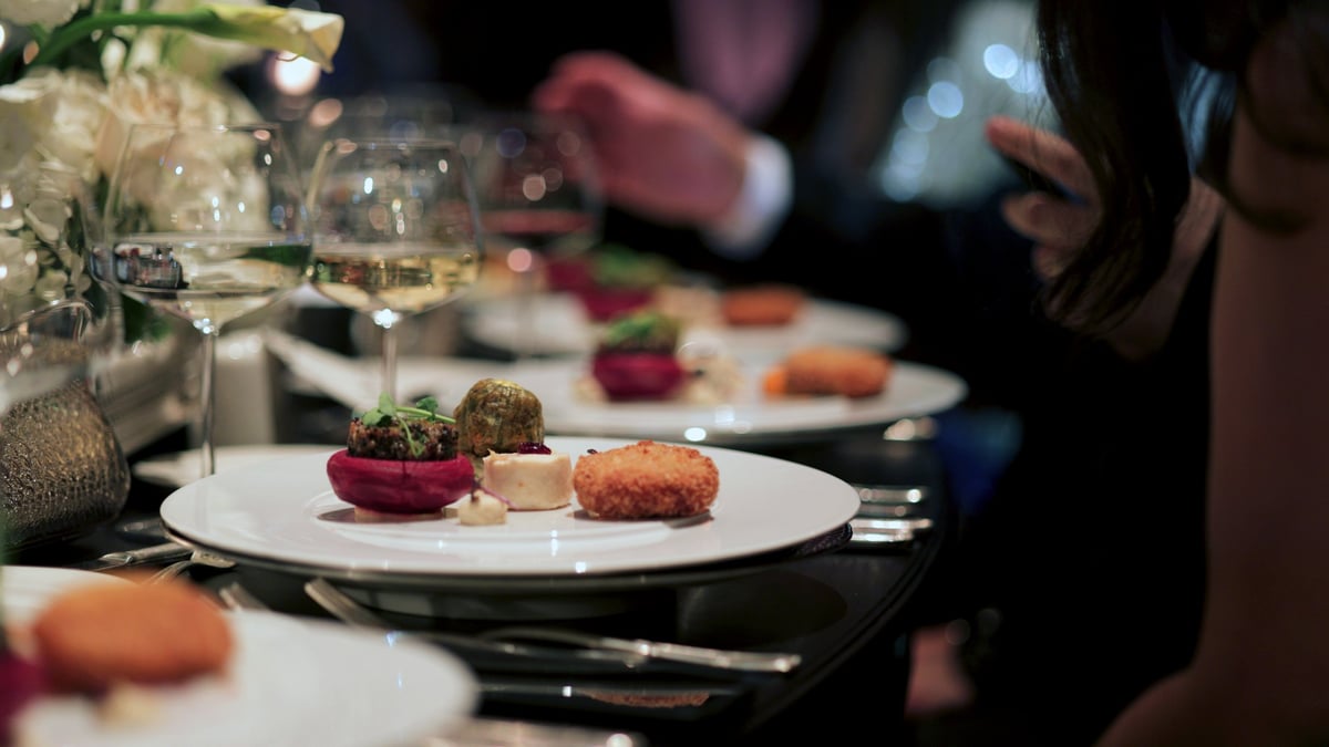A beautifully plated gourmet dish served at a sophisticated event