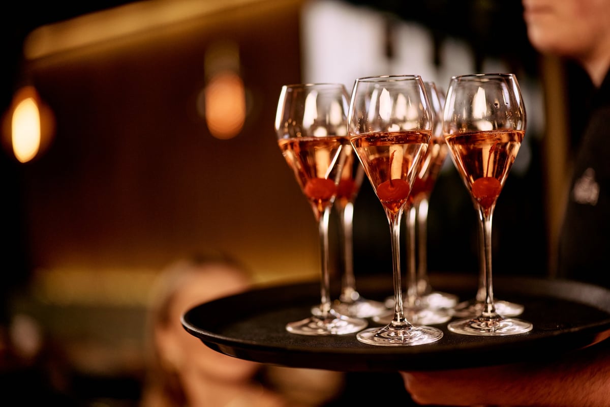 Glasses of sparkling wine served at an elegant event