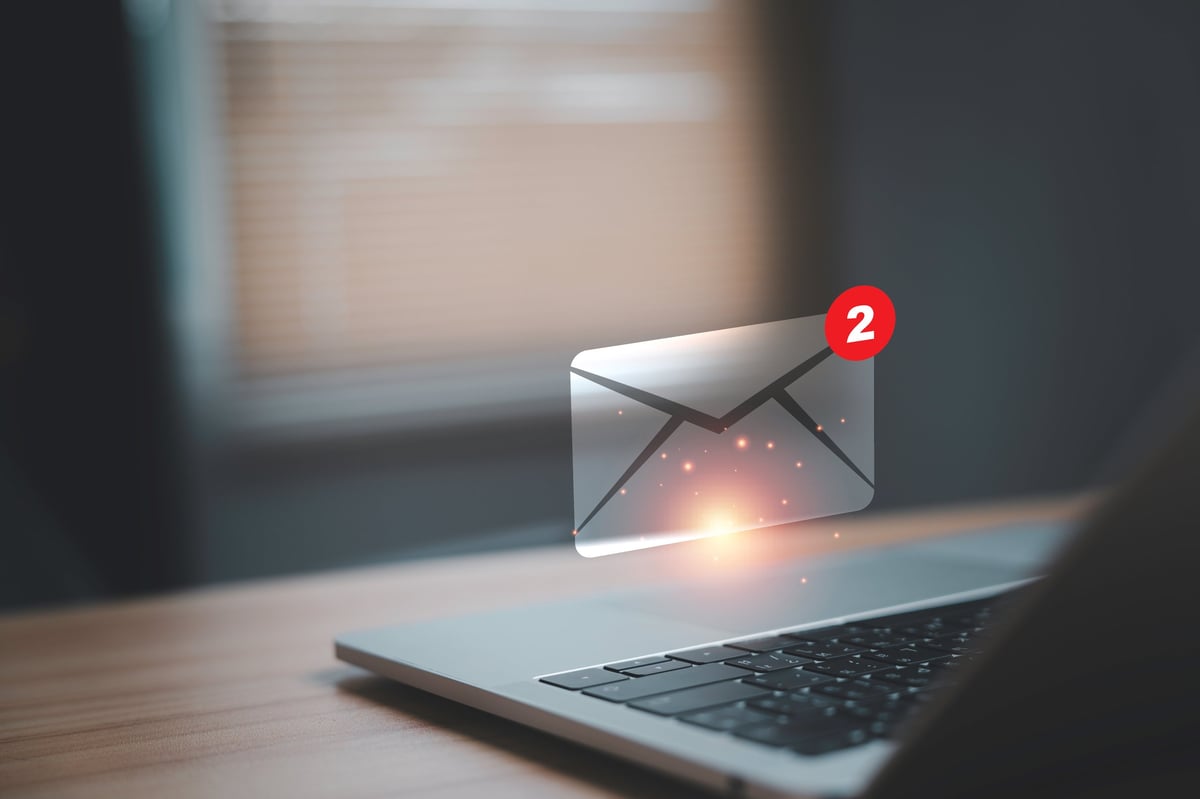 Email notification concept with unread message alert on laptop screen. Digital communication, inbox management, new email notification, online messaging, business workflow productivity.